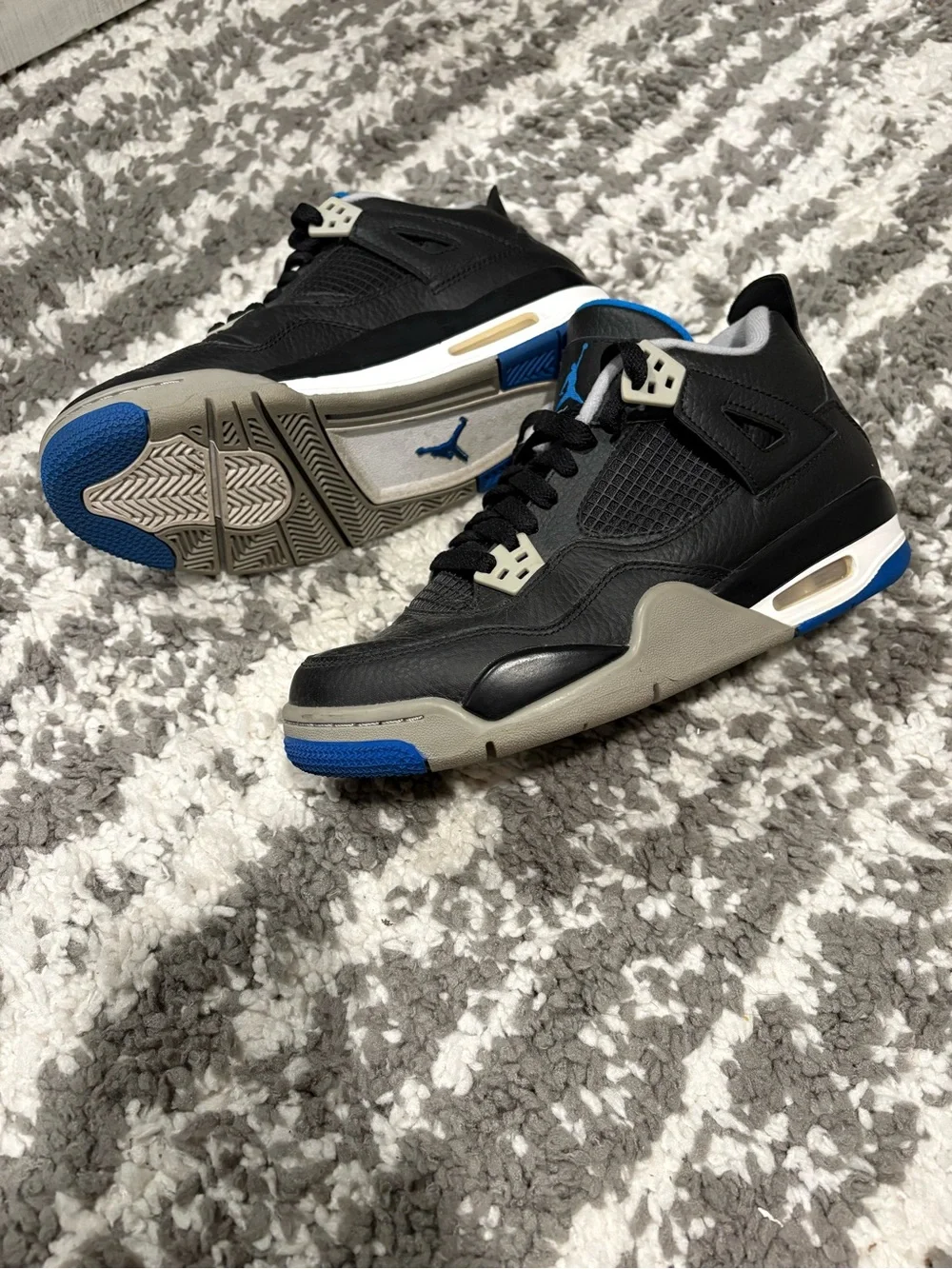 Nike Kids Black Sneakers with Blue Accents